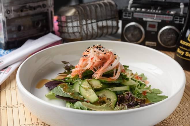 Cucumber Salad · Crabmeat and thinly sliced cucumbers served on a bed of spring mix. Glazed with ponzu, sweet chili sauce and sprinkled with sesame seeds.