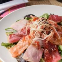Spicy Sashimi Salad · Red tuna, fresh salmon, yellowtail, crabmeat and cucumbers served on a bed of spring mix. Gl...