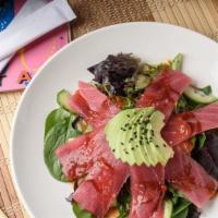 Spicy Tuna Sashimi Salad · Red tuna, cucumbers and avocado served on a bed of spring mix. Glazed with sweet chili sauce...