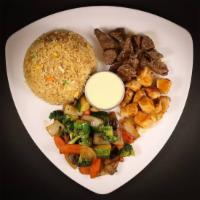 Filet Mignon and Chicken Combination · Grilled filet mignon and chicken served with fried rice, vegetables, miso soup or ginger sal...