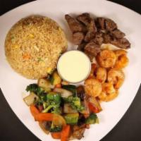 Filet Mignon and Shrimp Combination · Grilled filet mignon and shrimp served with fried rice, vegetables, miso soup or ginger salad.
