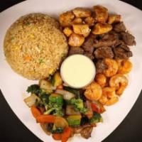 Chicken Shrimp and Filet Mignon Combination · Grilled filet mignon, shrimp and chicken served with fried rice, vegetables, miso soup or gi...