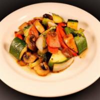 Vegetables · Grilled zucchini, broccoli, onions, carrots, and mushrooms.