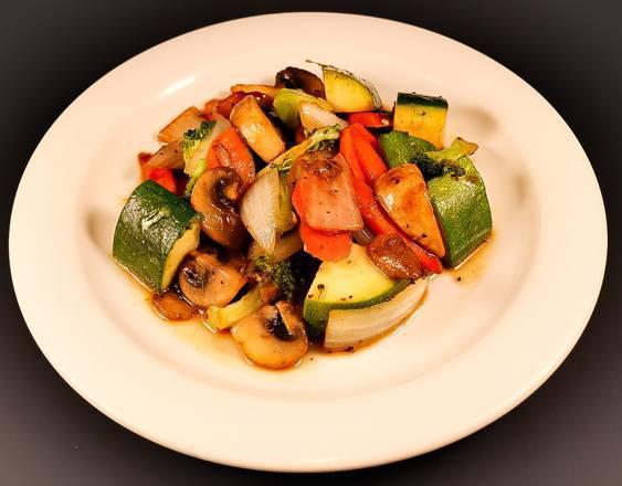 Vegetables · Grilled zucchini, broccoli, onions, carrots, and mushrooms.