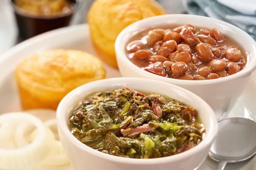 Beans n' Greens · A cup of our Pinto Beans and Turnip Greens cooked with Country Ham. Served with an onion slice, chow chow relish and vinegar. Served with  hand-rolled Buttermilk Biscuits (160 cal each) or Corn Muffins (210 cal each) and real butter.

