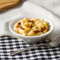 Macaroni n' Cheese · Elbow Macaroni Noodles mixed with cheese and baked in the oven for our signature Macaroni n'...
