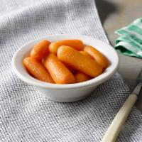Carrots · Whole baby carrots cooked with a hint of margarine and brown sugar.

