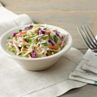 Cole Slaw · A mix of green cabbage, red cabbage and carrots tossed in a Coleslaw dressing.

