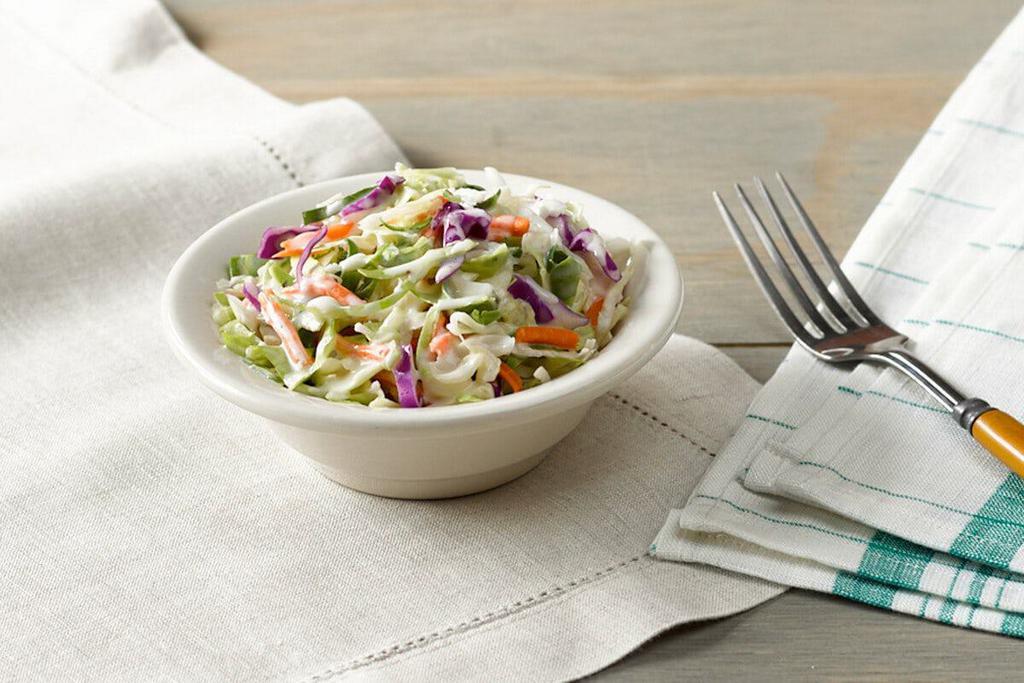 Cole Slaw · A mix of green cabbage, red cabbage and carrots tossed in a Coleslaw dressing.

