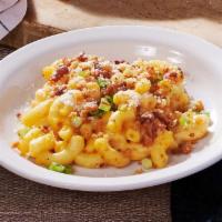 Bacon Mac n’ Cheese · There's a new way to enjoy a classic. Our creamy mac n' cheese comes topped with crispy baco...