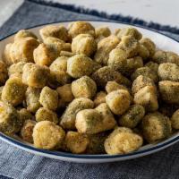 Fried Okra · Breaded Okra fried until golden brown. Packed hot and ready to serve. 

