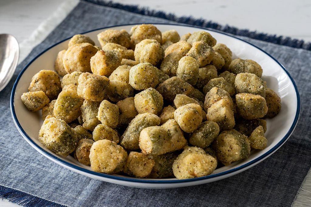 Fried Okra · Breaded Okra fried until golden brown. Packed hot and ready to serve. 

