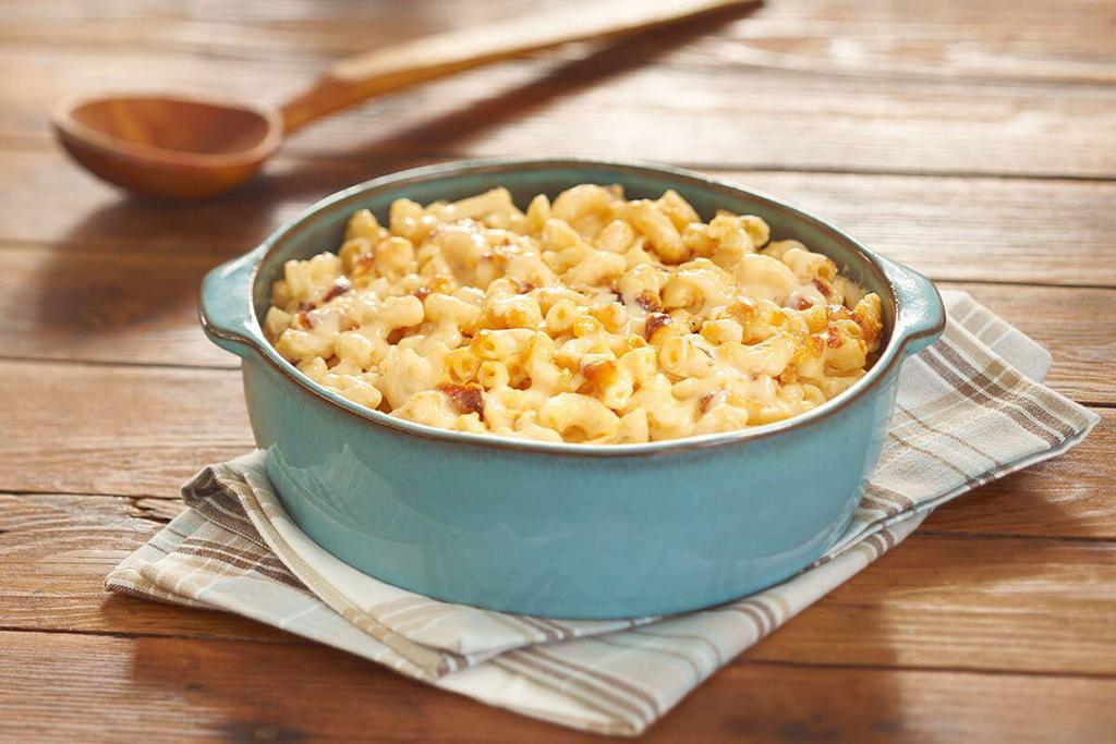 Macaroni n' Cheese  · Elbow Macaroni Noodles mixed with cheese and baked in the oven for our signature Macaroni n' Cheese. Packed hot and ready to serve.

