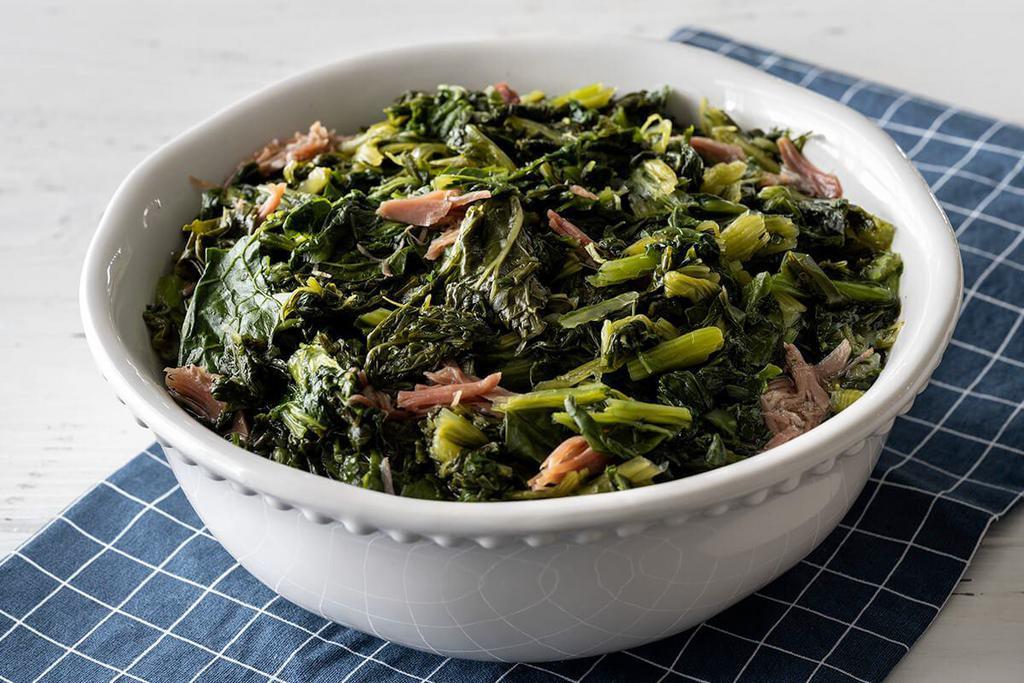 Turnip Greens  · Cooked Turnip Greens seasoned with country ham. Packed hot and ready to serve.
