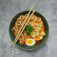Spicy Seafood Udon · Shrimp, calamari, fried tofu, boiled egg, bean sprouts, cilantro and scallions, udon noodles...