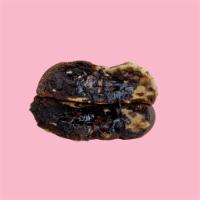 Brookie  · A chocolate chip cookie twisted with a chocolate cookie studded with white chocolate chips, ...