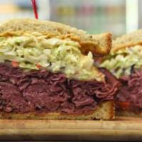 Hot New York Reuben Sandwich · 1st cut pastrami brisket or top round corned beef with Swiss cheese, colelaw and 1000 Island...
