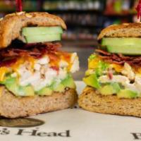 Hot Wisconsin Cheddar Melt · Homemade chicken salad served hot with melted sharp cheddar cheese, extra crispy bacon, cucu...