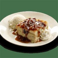 Dave's Award-Winning Bread Pudding · Melt-in-your-mouth, scratch-made bread pudding. Served with pecan praline sauce, vanilla ice...