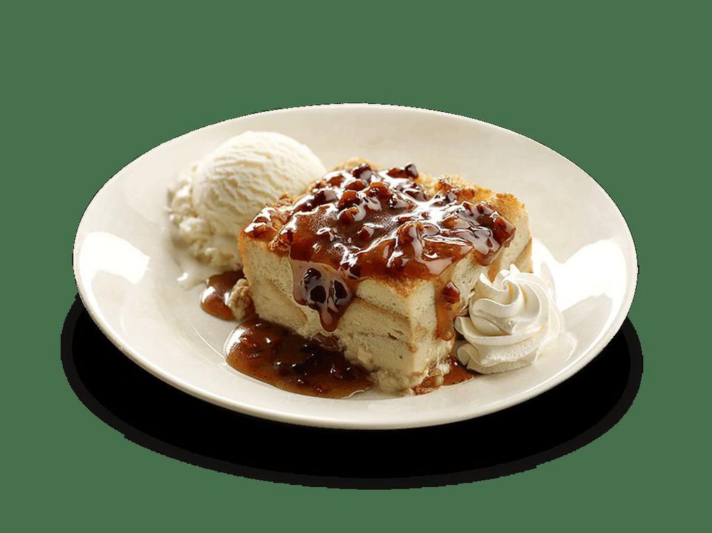 Dave's Award-Winning Bread Pudding · Melt-in-your-mouth, scratch-made bread pudding and pecan praline sauce, served with vanilla ice cream on the side.