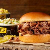 Brisket Classic Sandwich Plate. · Includes a choice of chopped or sliced delicious slow-smoked brisket on a Brioche bun, serve...