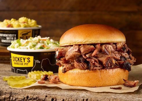 Brisket Classic Sandwich Plate. · Includes a choice of chopped or sliced delicious slow-smoked brisket on a Brioche bun, served with 2 sides.