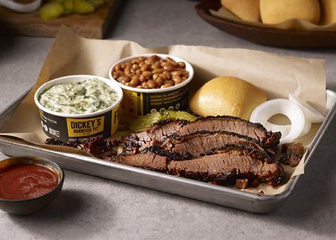 Brisket Plate · Slow smoked Brisket sliced or chopped, served with 2 sides and a roll