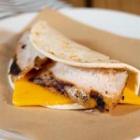 Chicken & Cheese Taco · Slow smoked marinated chicken, cheddar cheese on a flour tortilla