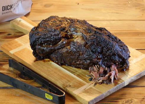 Whole Pork Butt · A whole pork butt dry rubbed with our secret rib rub spices slow then slow smoked for 12 hours in our hickory wood pit. Feeds 12-15 folks.