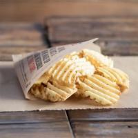 Waffle Fries · Crisp crinkle cut fries dusted with our signature seasoning mix
