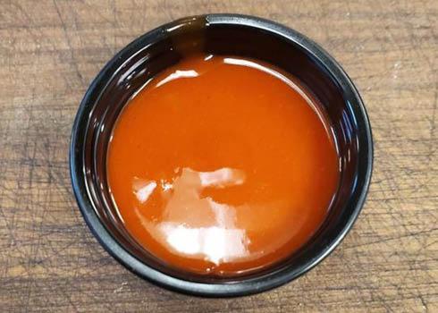 Buffalo Hot Sauce · Red Pepper sauce spiked with red chilis
