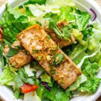 Spicy Organic Tofu Salad · Mix of romaine, cabbage trio, bell peppers, herbs, shredded carrots, diced cucumbers, cherry...