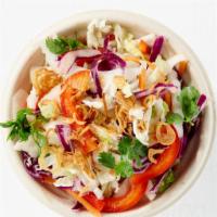 Cambodian Slaw · Napa cabbage, red cabbage, white cabbage, bell peppers, fresh herbs and house dressing. Spicy.