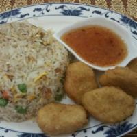 73. Kids Fried Rice with Fried Chicken · Fried rice with eggs, carrots, green peas and fried chicken. Served with sweet and sour sauce.