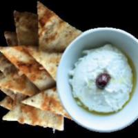 Simply Tzatziki · Strained Greek yogurt, garlic and cucumber, refreshing and complementary to all meats and ve...