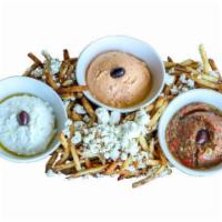 Suggestive Mezze Platter · A little taste of everything! includes all three of our homemade spreads with warm, seasoned...