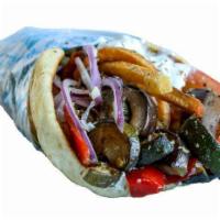 Virgin Pita · Grilled zucchini, grilled eggplant, grilled red bell peppers, tomatoes, onion, tzatziki, and...