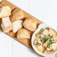Scampi · Garlic, butter, sherry and lemon. Served with ciabatta.