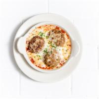 Baked Italian Meatballs · Handmade beef and pork meatballs, marinara and melted cheese.