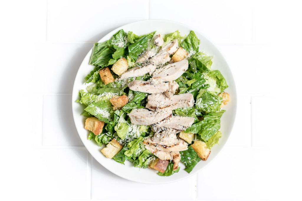Chicken Caesar Salad · Grilled chicken breast, house-made croutons and Parmesan.