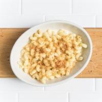 Mac 'N Cheese · Aged white cheddar, Parmesan, Oakshire Amber Ale and breadcrumbs.