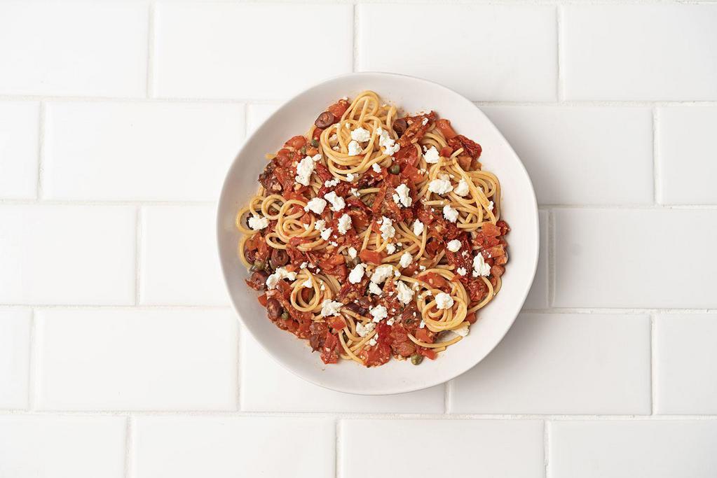 Spaghetti Siciliano  · Fresh and sun-dried tomatoes, garlic, Kalamata olives, capers, sherry, feta cheese