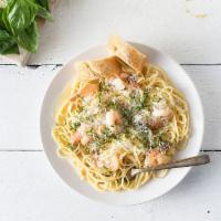 Linguini with Shrimp Scampi · Light and flavorful with a zesty kick of lemon. Tender shrimp sautéed with butter, garlic, l...