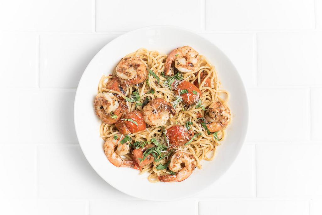 Spaghetti con Gamberetti · Spicy shrimp tossed with grilled tomatoes, fresh mozzarella, garlic, basil, oregano, chili flakes, Parmesan.