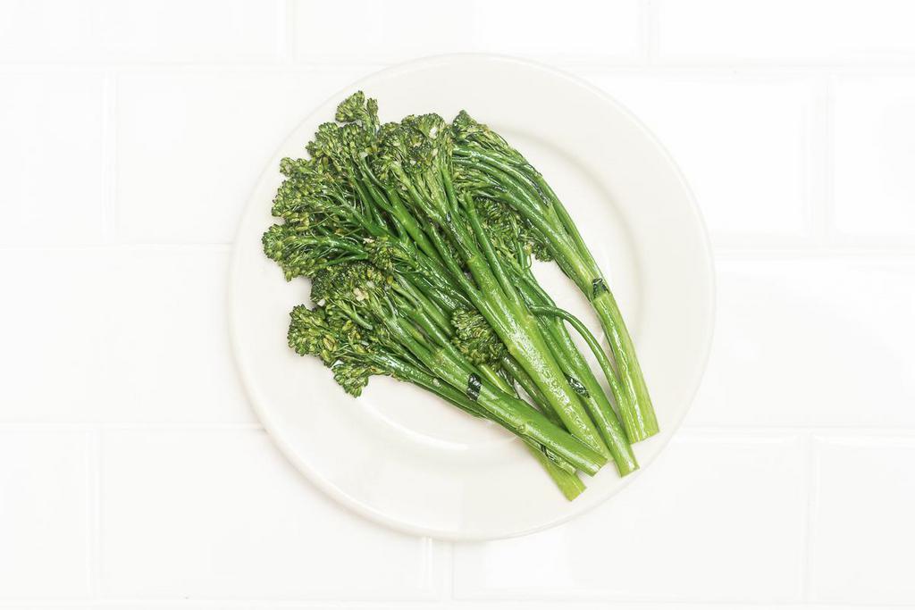 Broccolini · Sauteed in garlic and olive oil with fresh herbs.