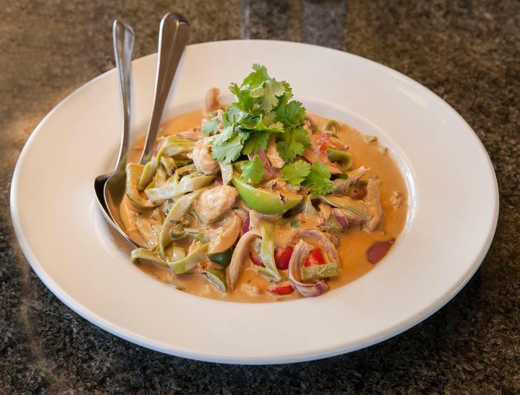 Chicken Tequila Fettuccine · Spinach fettuccine, bell peppers, red onion, jalapeno and tequila-lime cream sauce.
