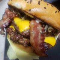 Yellow Jacket Burger · Two 1/3 burger patties served on black sesame seed bun with garlic aioli, grilled onion, mel...