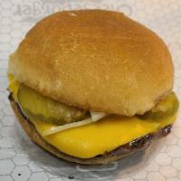 Fast Food Burger · A fresh grilled burger with American cheese, pickles, yellow onions, and topped with Beez Fr...