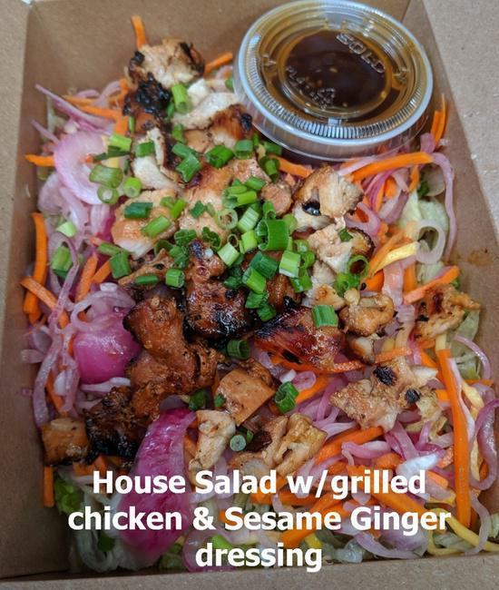 Hunny Beez Salad · A bed of romaine lettuce, mango slaw, green onions, your choice of meat and salad dressing.