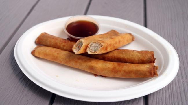 Shanghai Pork Lumpia (3) · Hand rolled Filipino Eggrolls, filled with ground pork, green onions, garlic, & carrots, served with a side of Hunny Beez Sauce.